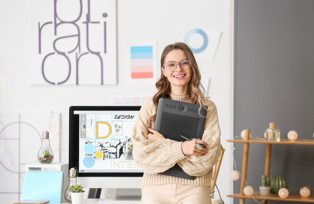 a woman holding a tablet