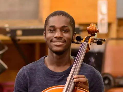 a man playing a violin