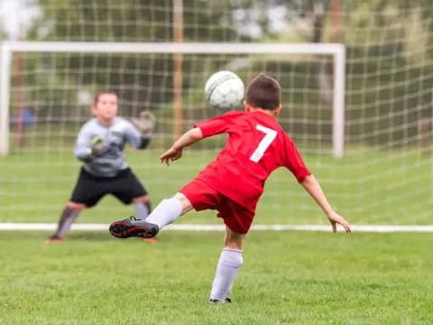 a couple of kids playing football
