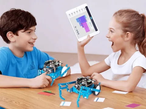 a boy and girl playing with toys