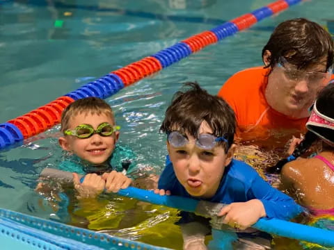 a group of people in a pool