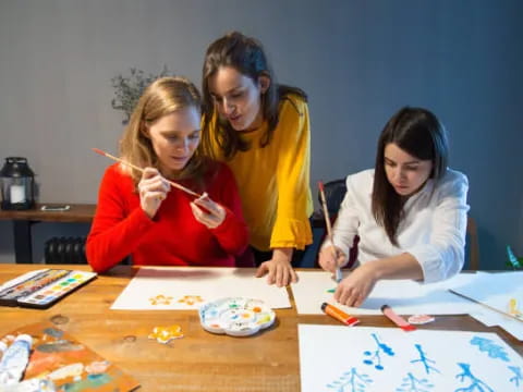 a group of girls painting