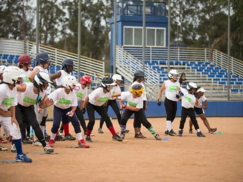 a group of kids playing softball
