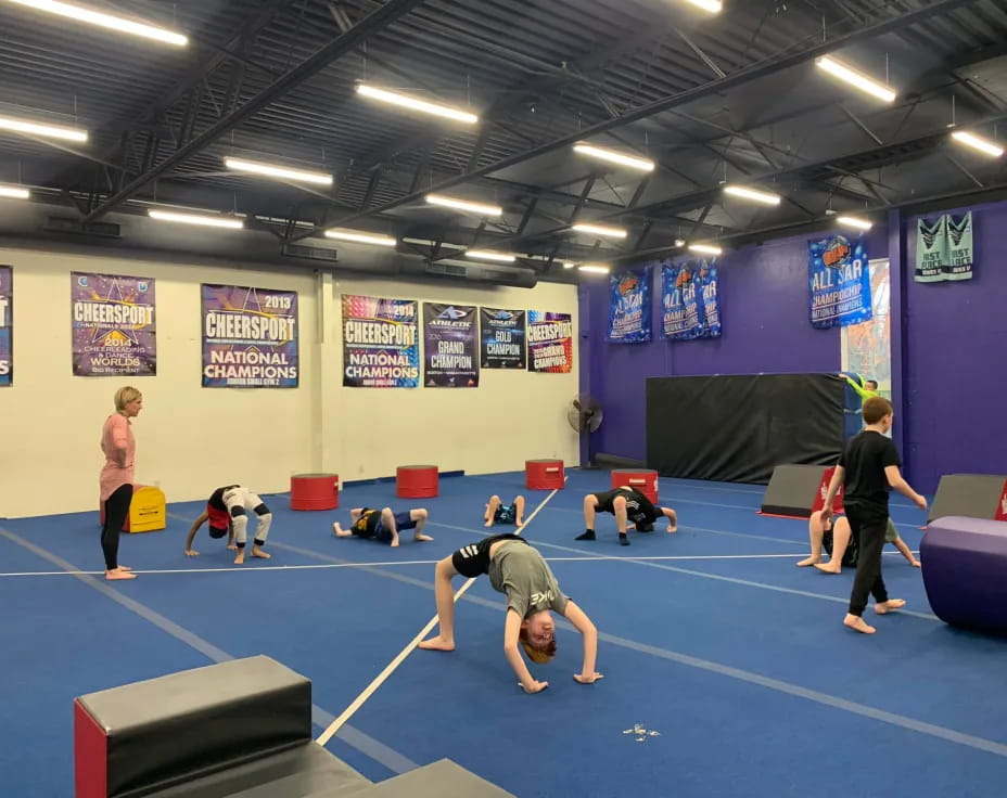 a group of people in a gym