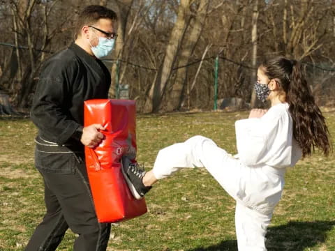 a man and woman holding a red bag and a woman holding a red bag