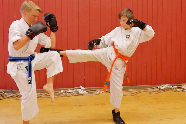 two people in white uniforms