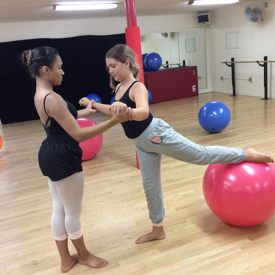 a couple of women exercising