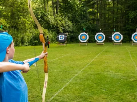 a person holding a bow and arrow
