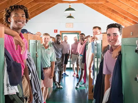 a group of people in a hallway