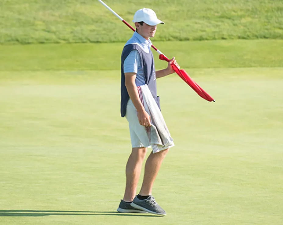 a person playing golf