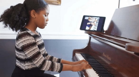 a person playing a piano