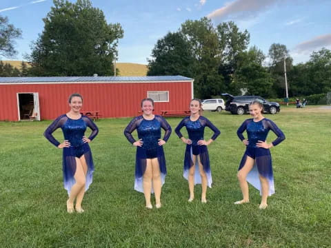 a group of women in blue uniforms