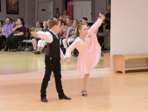 a man and woman dancing