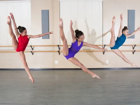 a group of women doing yoga
