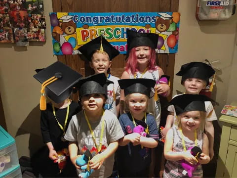 a group of kids wearing clothing