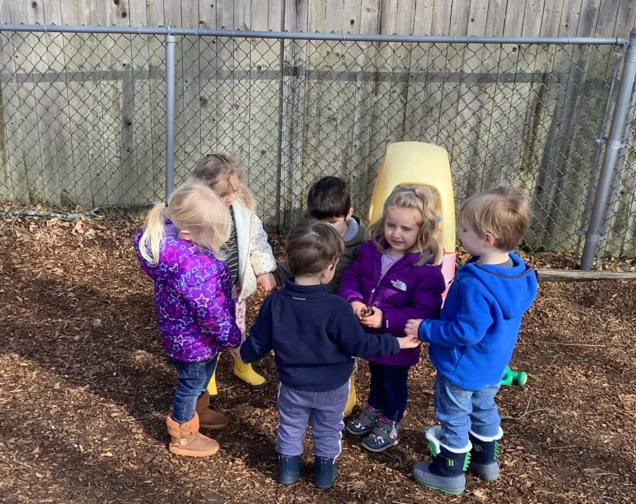 a group of children in a field