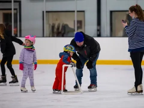 a group of people on ice skates