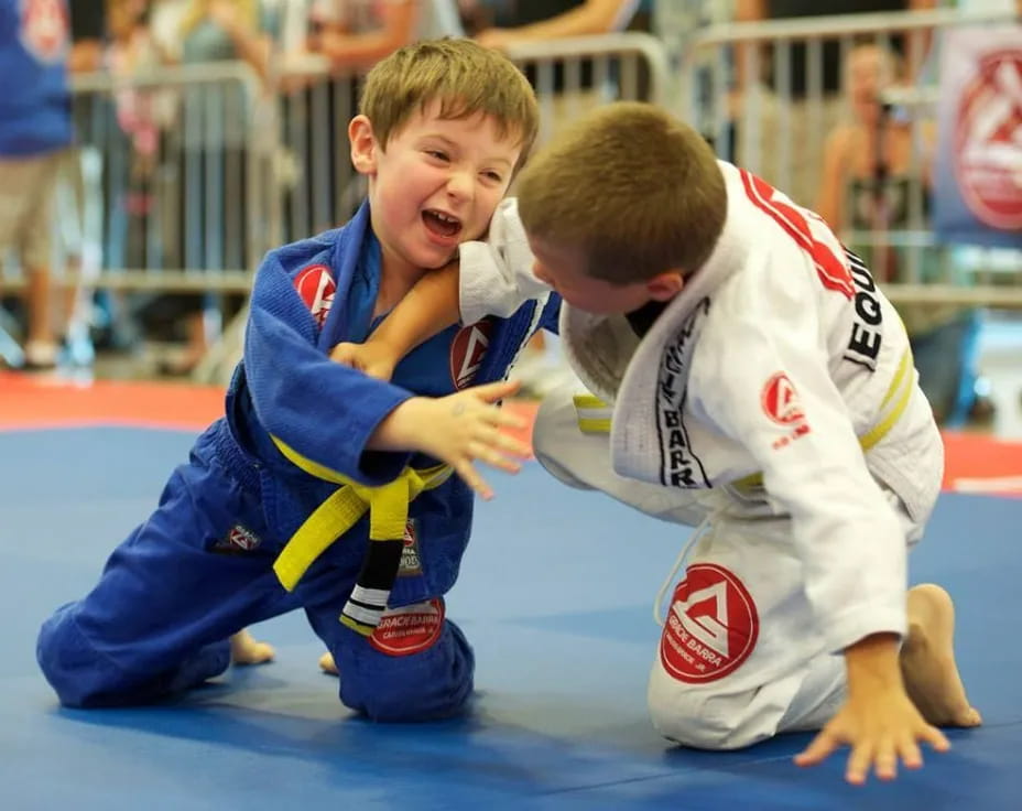 two boys in a wrestling match
