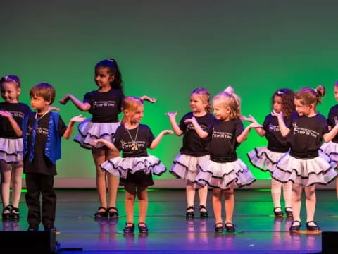 a group of children on a stage