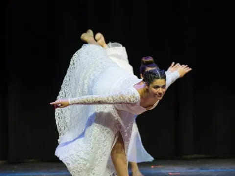 a person dancing on a stage