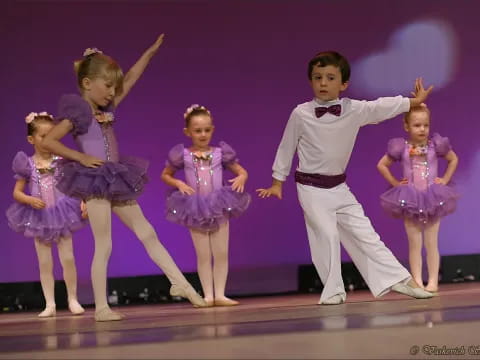 a group of children dancing