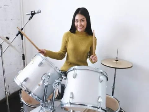 a person playing drums