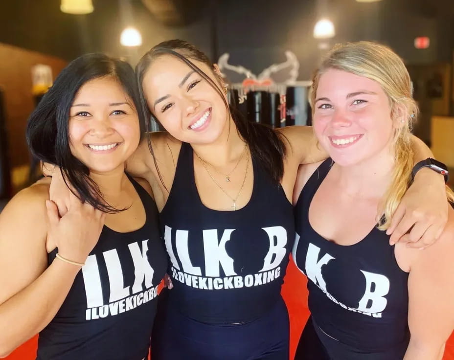 a group of women posing for a photo