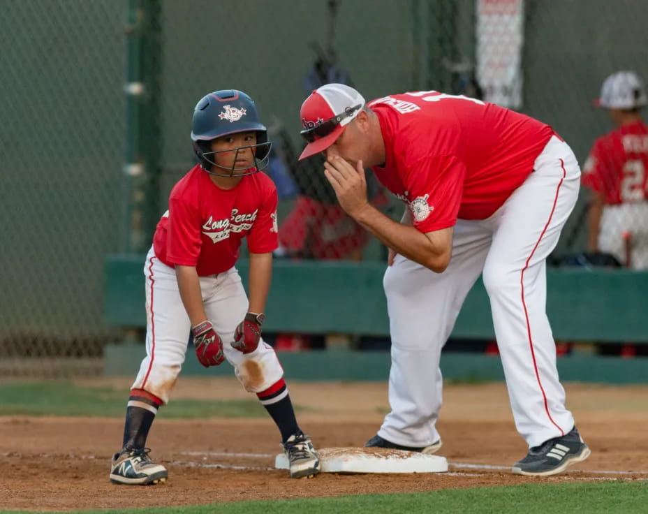 a baseball player is trying to hit a baseball