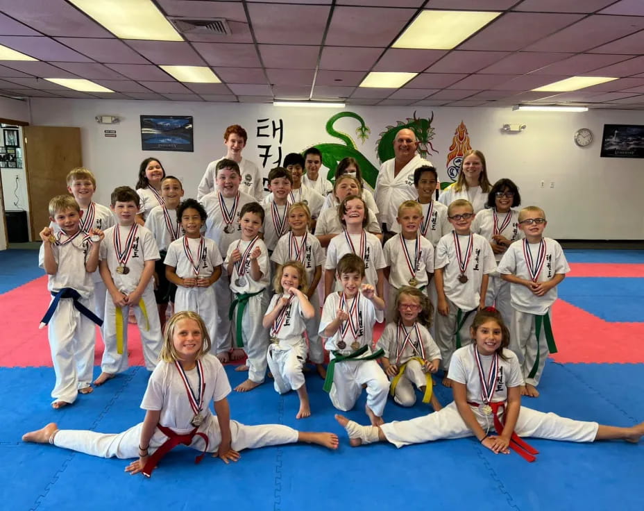 a group of people wearing medals