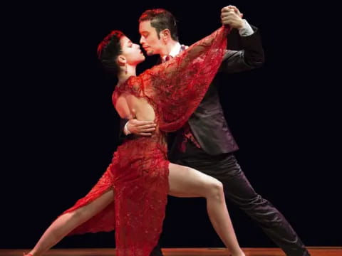 a man and woman dancing