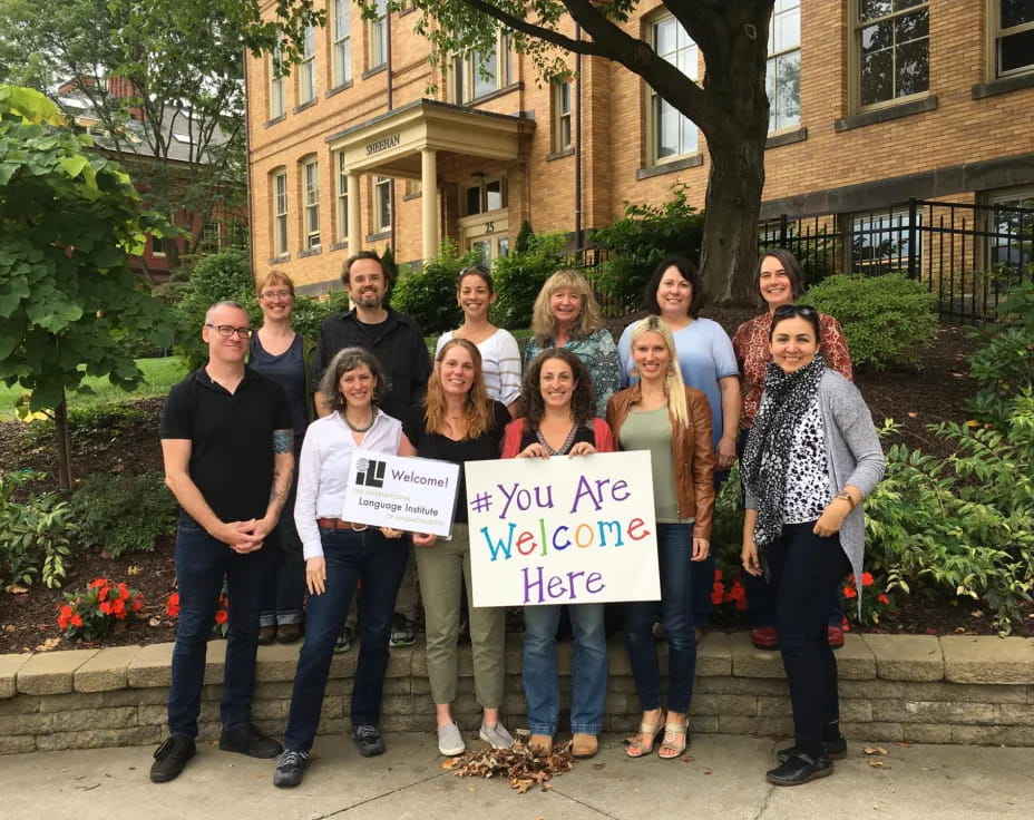 a group of people holding signs
