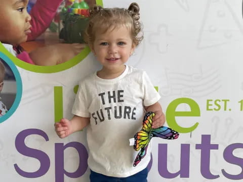 a child holding a toy