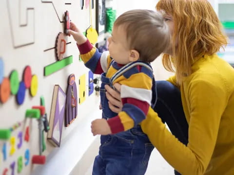 a person holding a baby