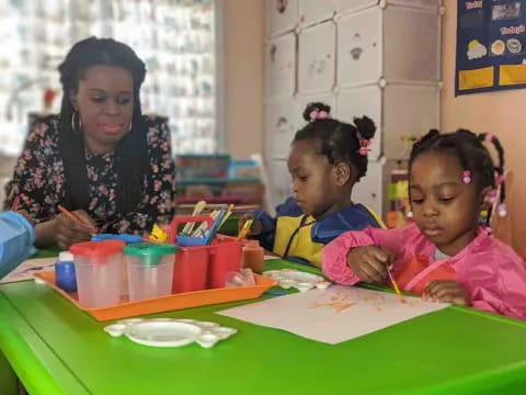 a person and a few children