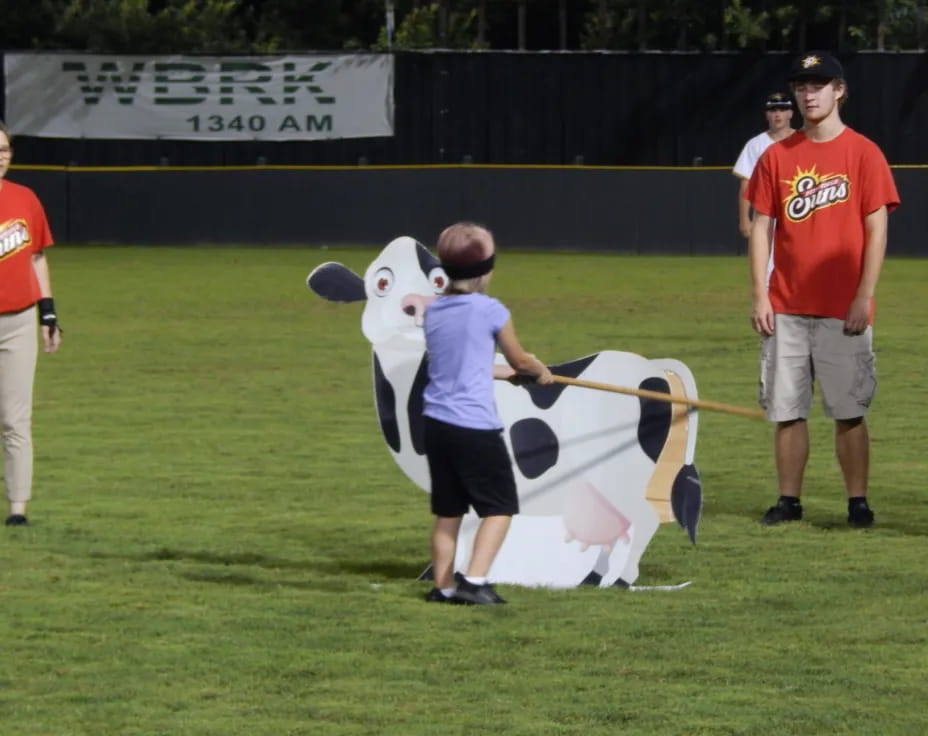 a boy holding a kite