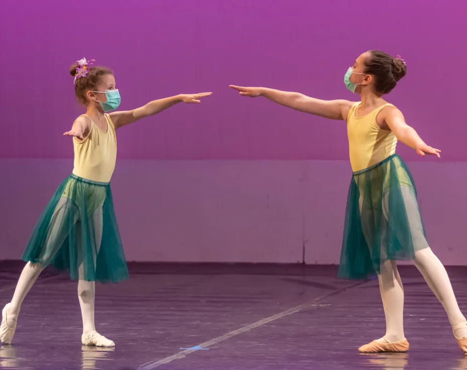 a couple of women dancing