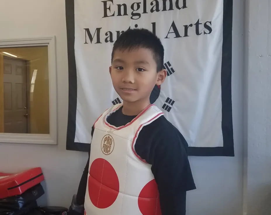 a boy wearing a garment