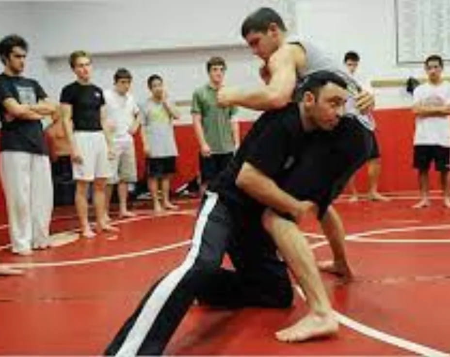a group of people in a gym