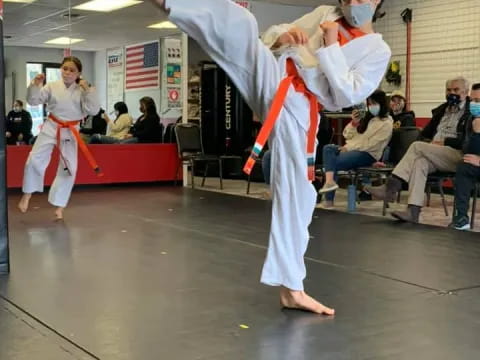 a man in a karate uniform