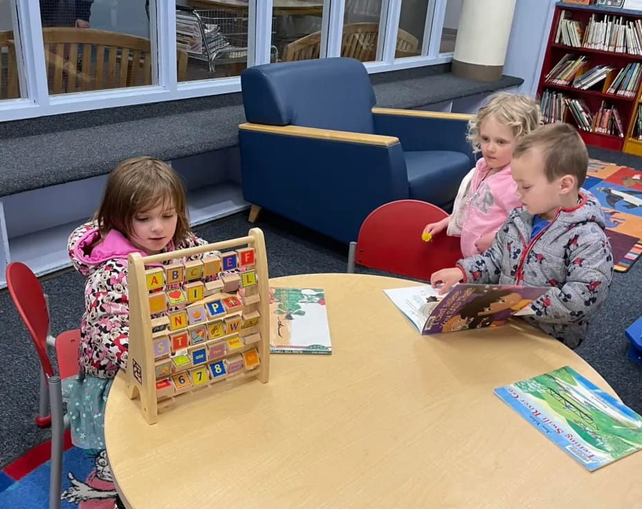 children sitting at a table