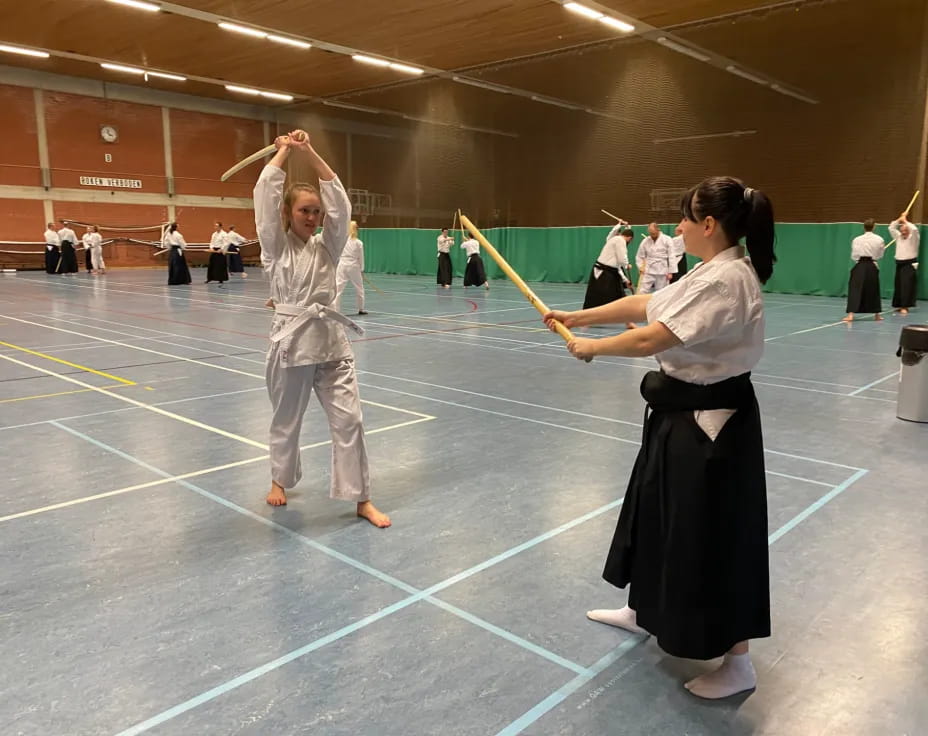 a group of people in a gym