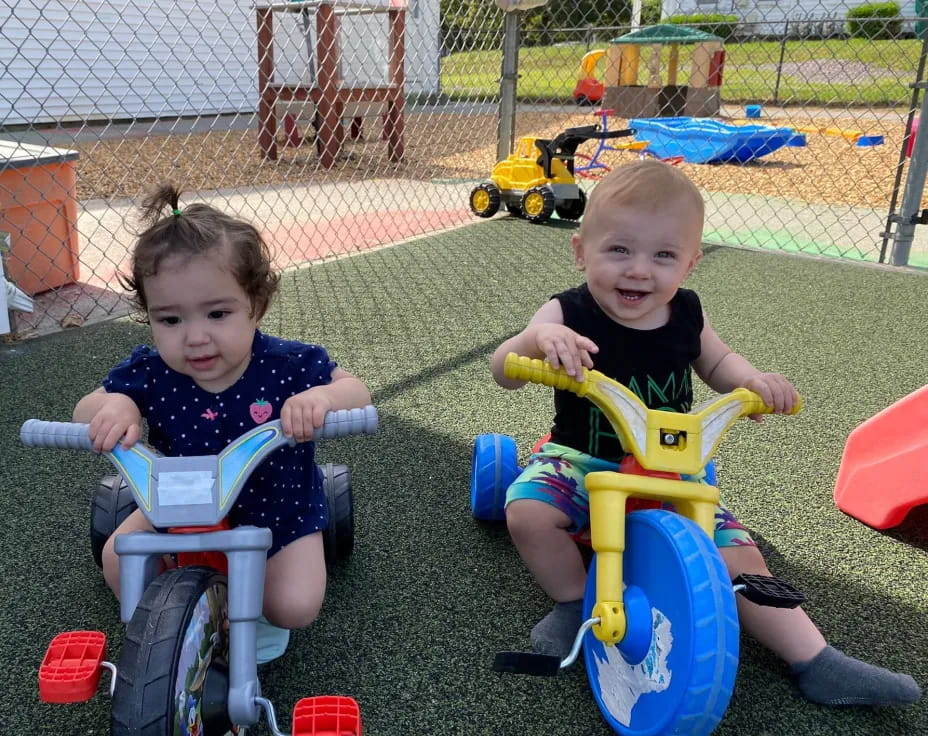 two children sitting in chairs