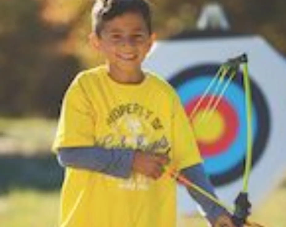 a boy holding a flag