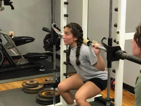 a woman working out in a gym