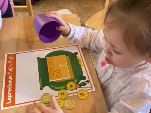 a baby playing with a toy