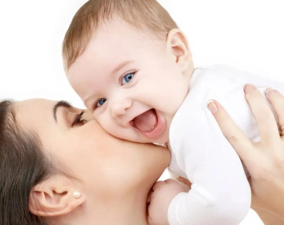 a person holding a baby