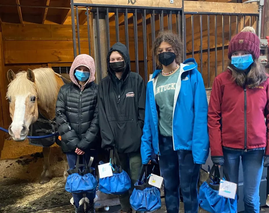 a group of people wearing masks