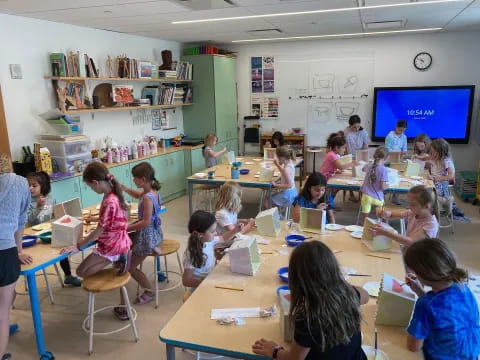 a group of children in a classroom