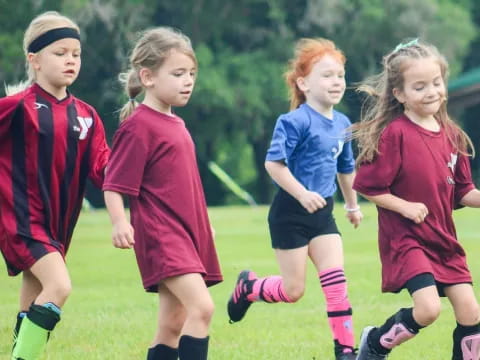 a group of girls in a field