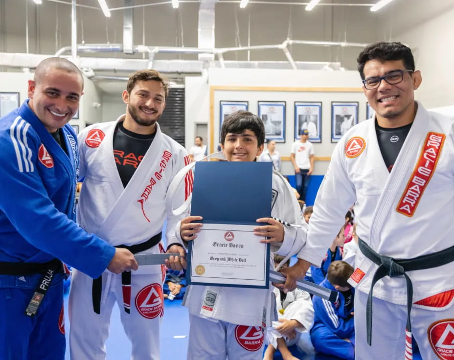 a group of men holding a trophy
